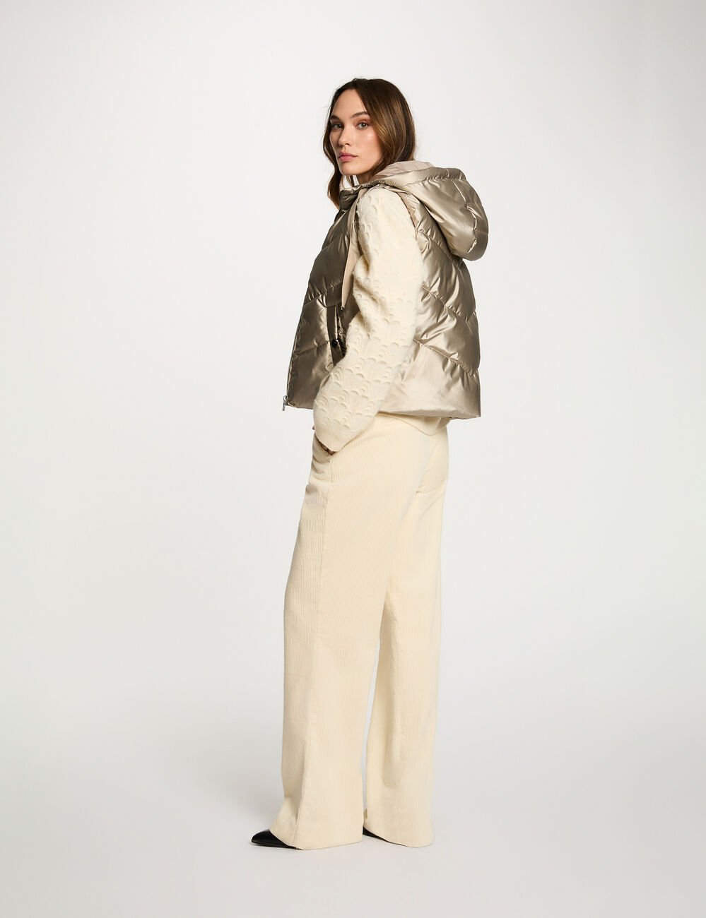 Glanzende mouwloze bodywarmer goudgeel vrouw