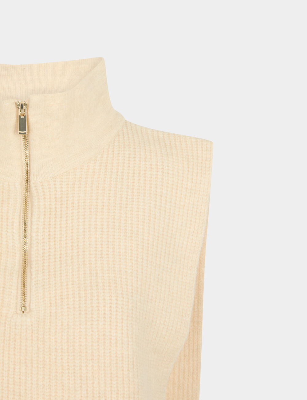 Poncho col zippé ivoire femme