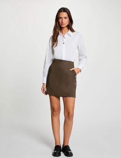 Nauwsluitende korte rok brons vrouw