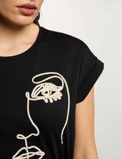 T-shirt broderie visage noir femme