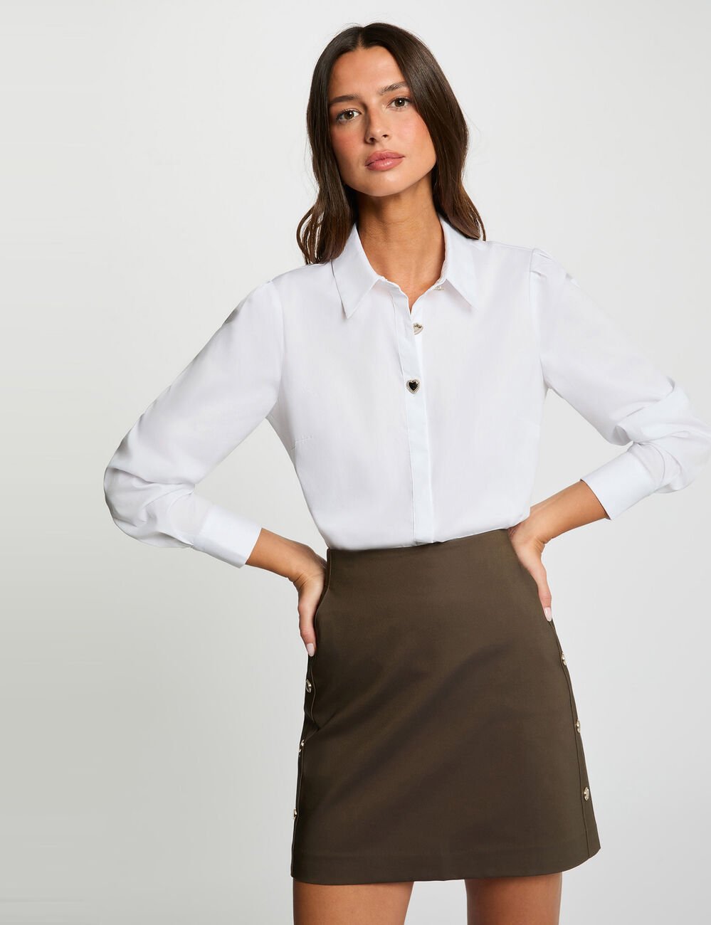 Nauwsluitende korte rok brons vrouw