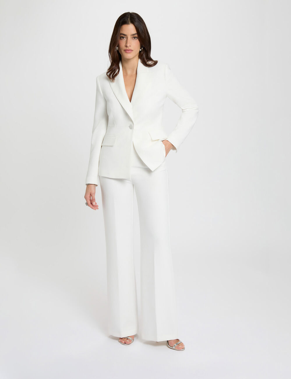 Hoge taille brede broek helder wit vrouw