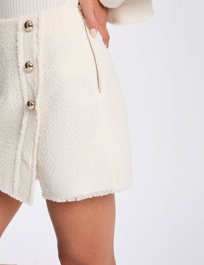 Nauwsluitende korte rok ivoor vrouw