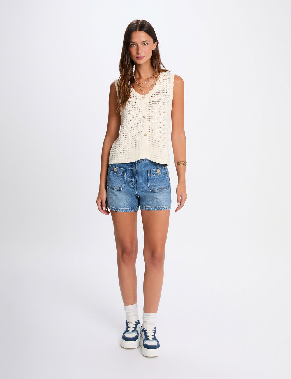 Mouwloos opengewerkt vest ivoor vrouw