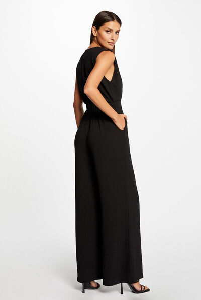 Combinaison jambe large détail boucle noir femme