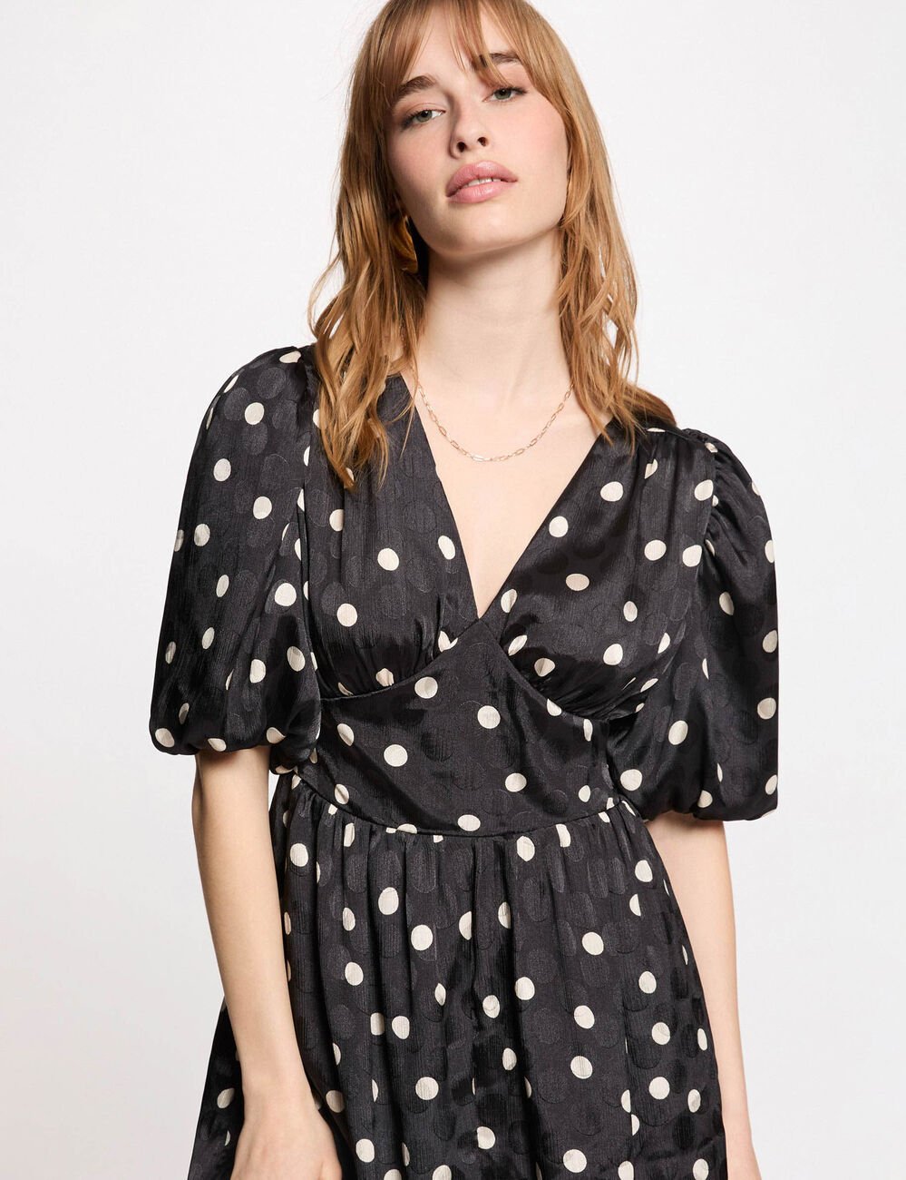 Korte jurk met pofmouwen zwart vrouw