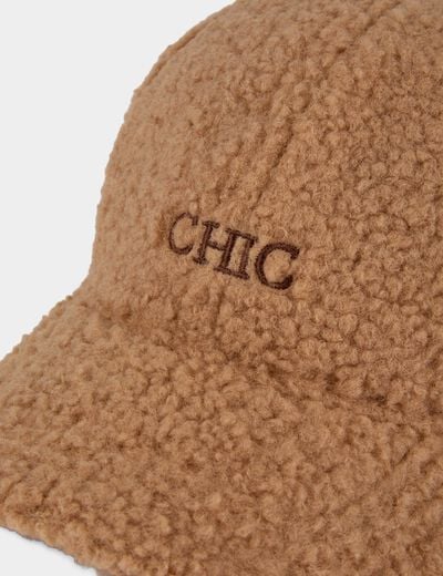 Petten van imitatiebont camel vrouw