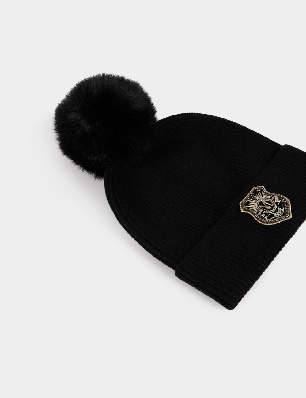 Bonnet à pompon noir femme