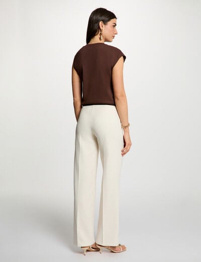 Asymmetrische mouwloze top donker bruin vrouw