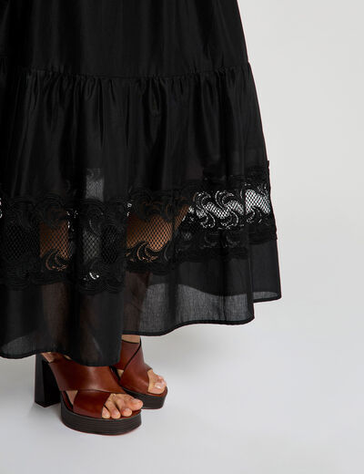 Lange rok met lagen zwart vrouw