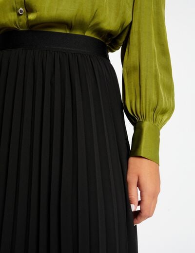 Lange uitlopende plooirok zwart vrouw