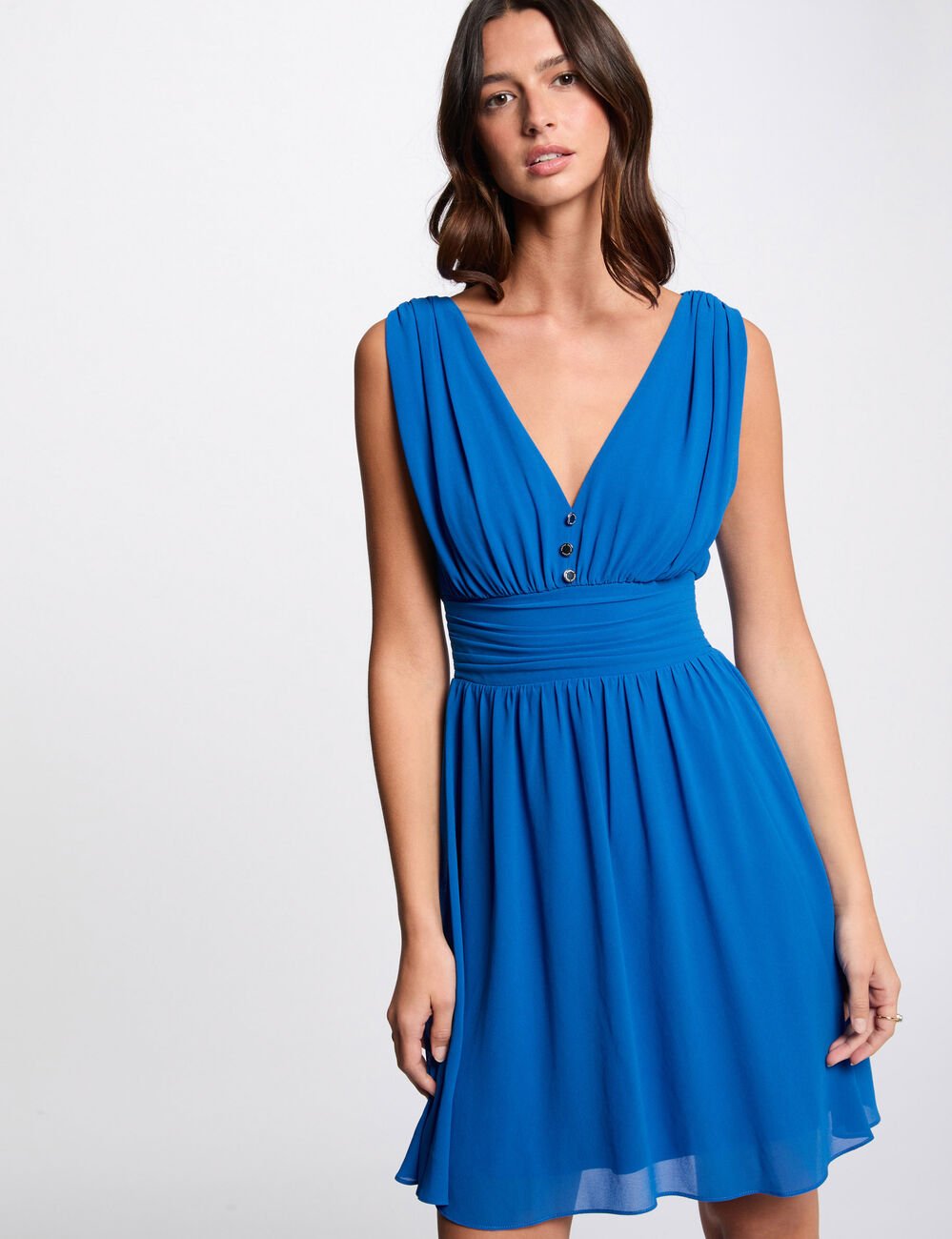 Korte vloeiende uitlopende jurk bleu electrique vrouw