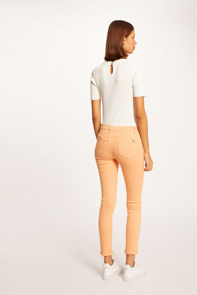Skinny jeans met lage taille lichtoranje vrouw