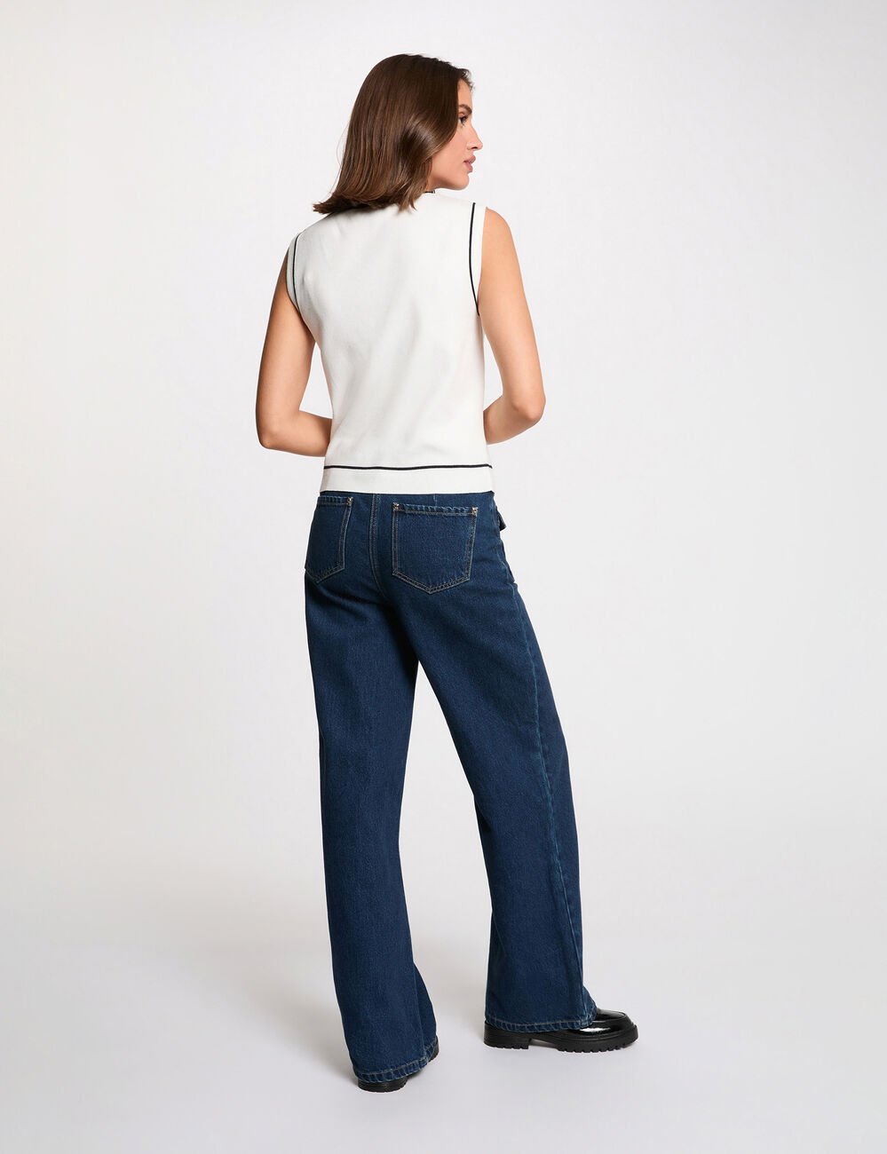 Pull sans manches col v blanc femme