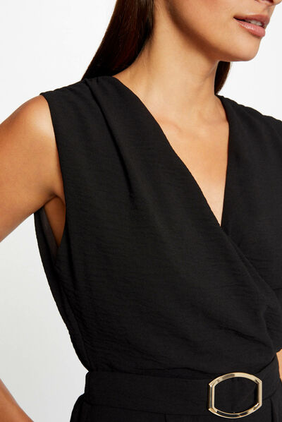 Combinaison jambe large détail boucle noir femme