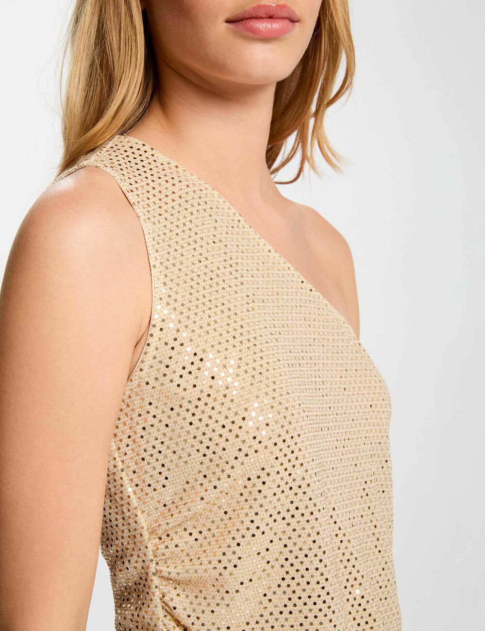 Top asymétrique strass couleur argent femme