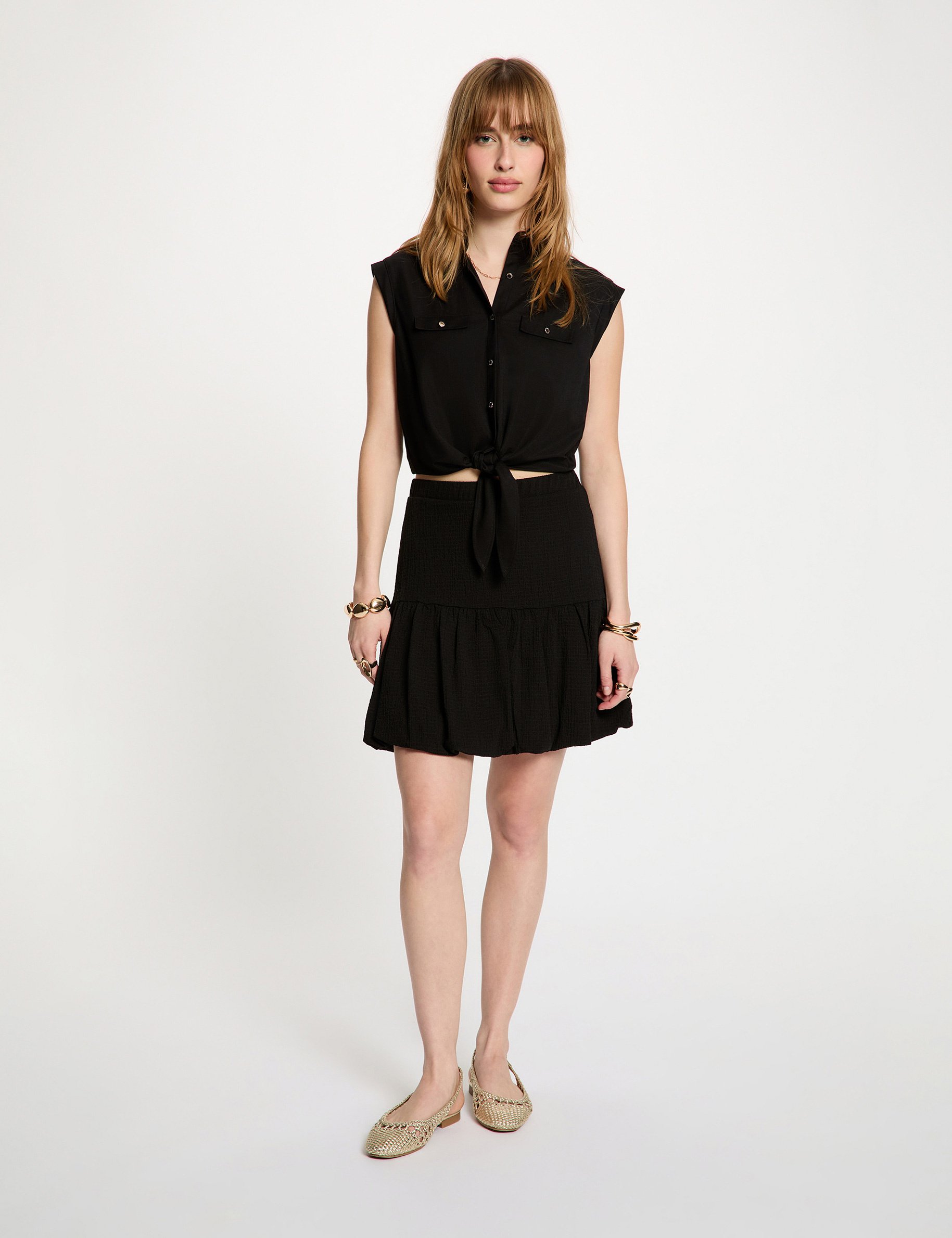 Korte geplooide rok zwart vrouw