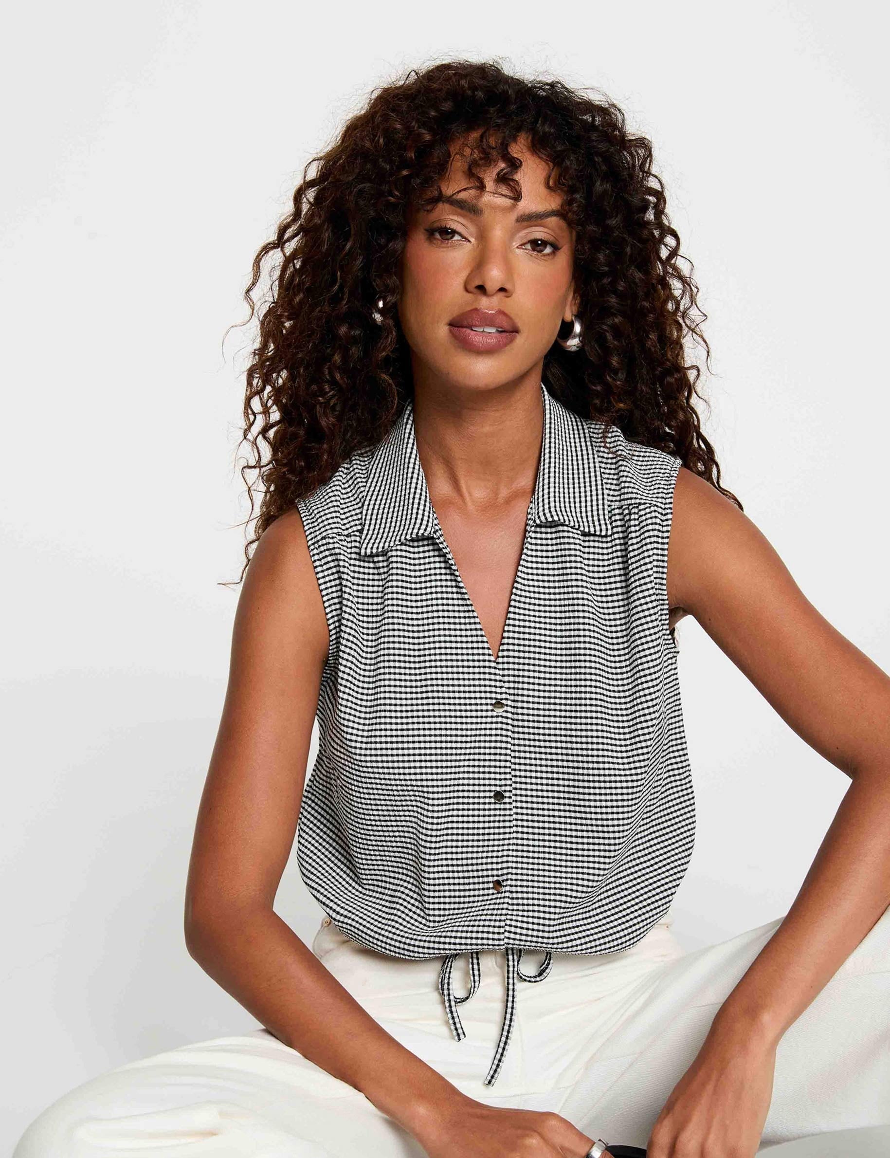 Mouwloze geknoopte blouse zwart vrouw