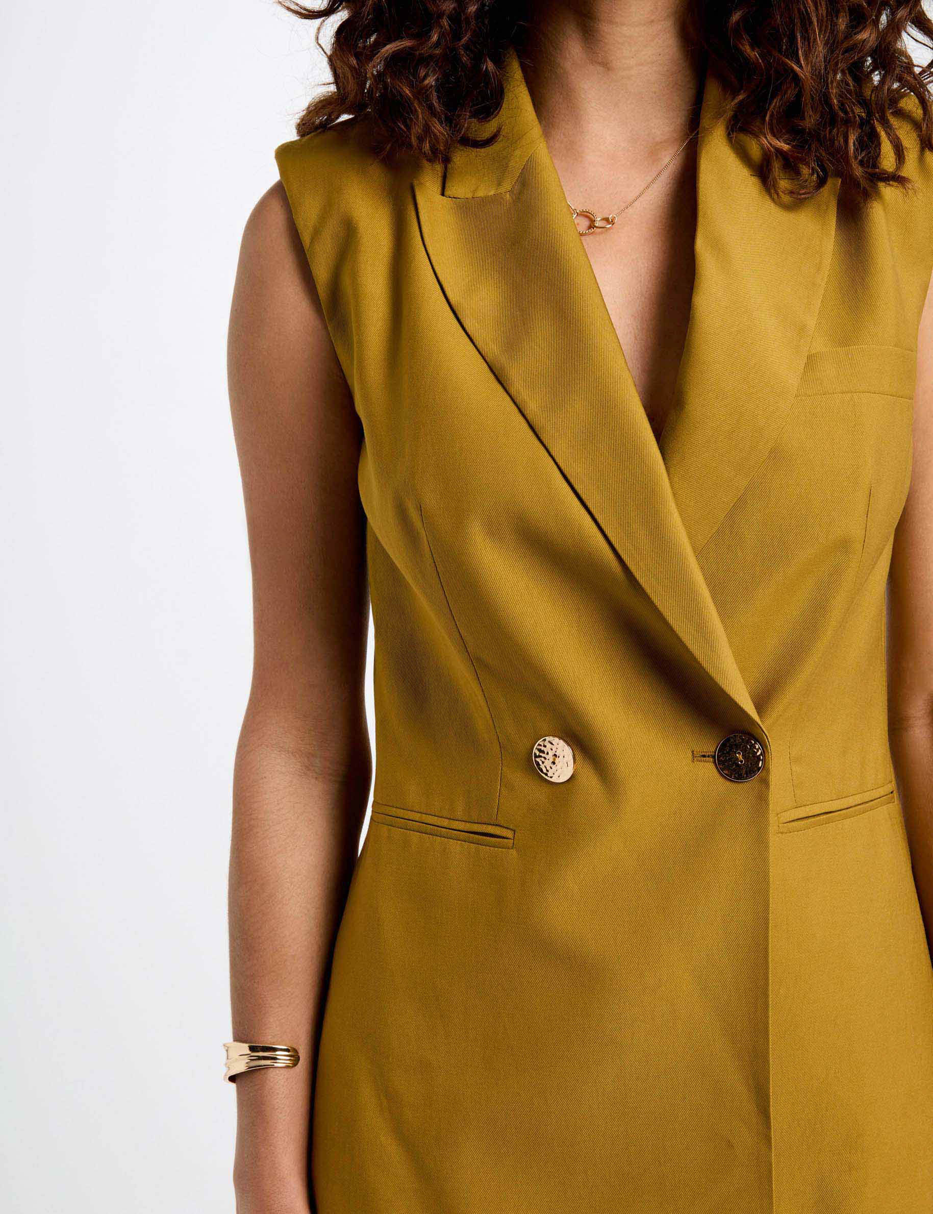mouwloze blazer brons vrouw Mouwloze blazer brons vrouw