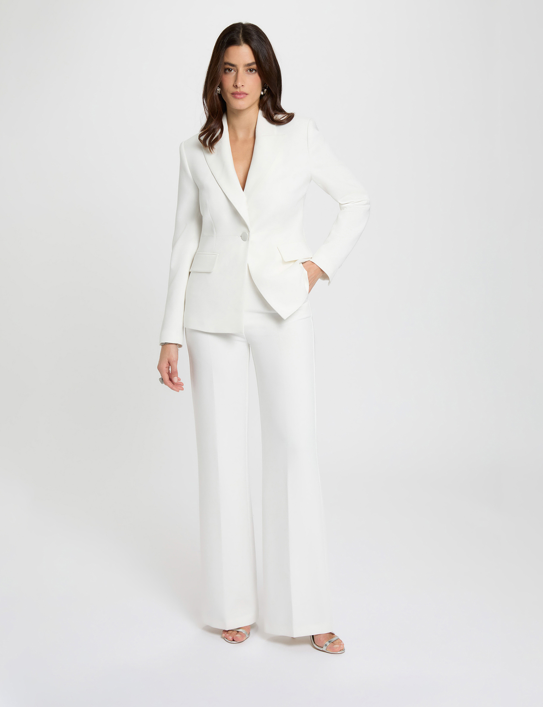 Hoge taille brede broek helder wit vrouw