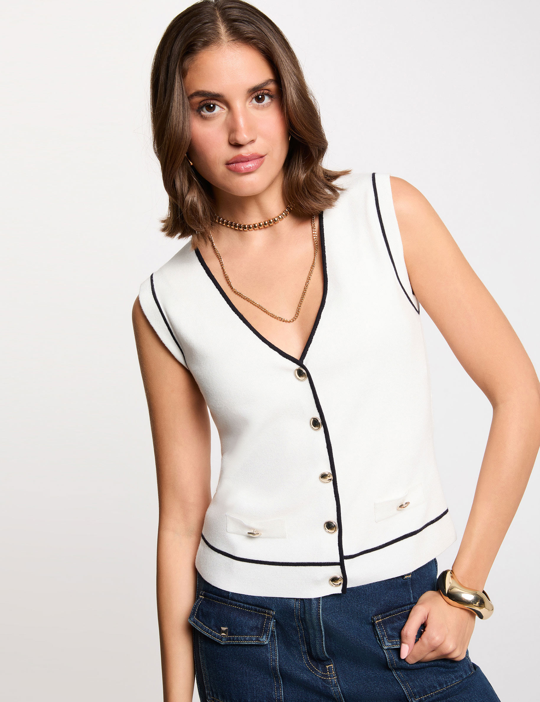 Pull sans manches col v blanc femme