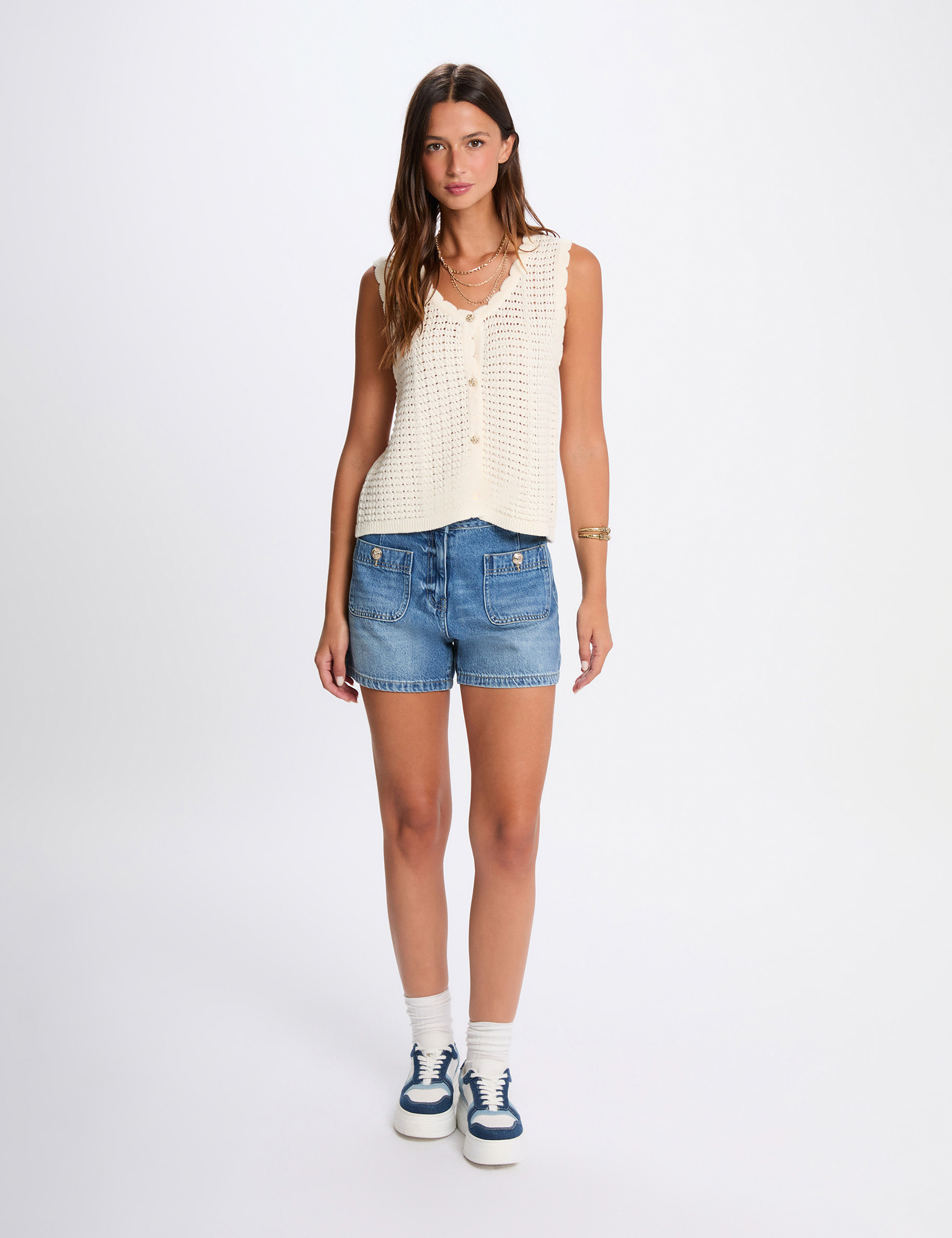 Mouwloos opengewerkt vest ivoor vrouw