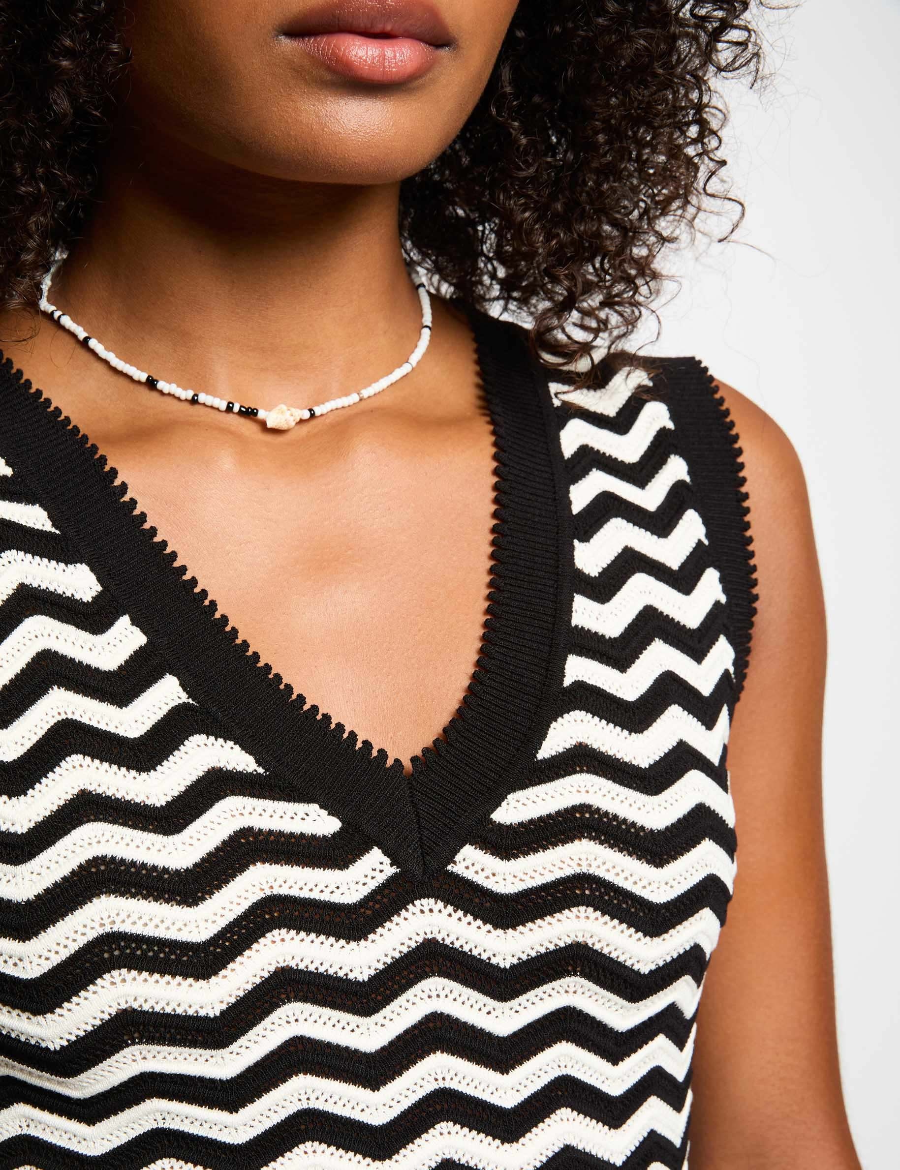 mouwloze gebreide top met strepen zwart vrouw Mouwloze gebreide top met strepen zwart vrouw