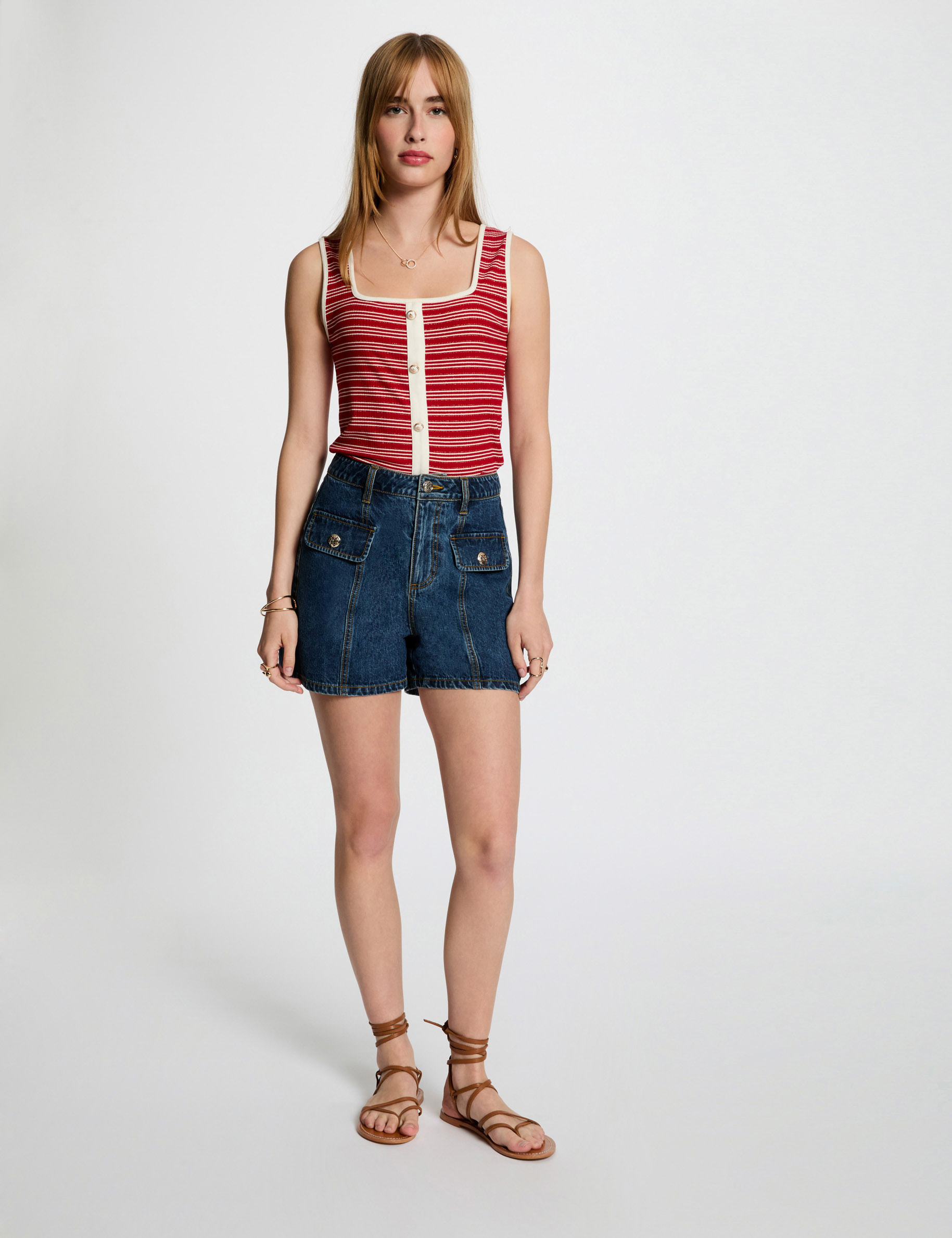 gestreepte mouwloze tanktop helder wit vrouw Gestreepte mouwloze tanktop helder wit vrouw