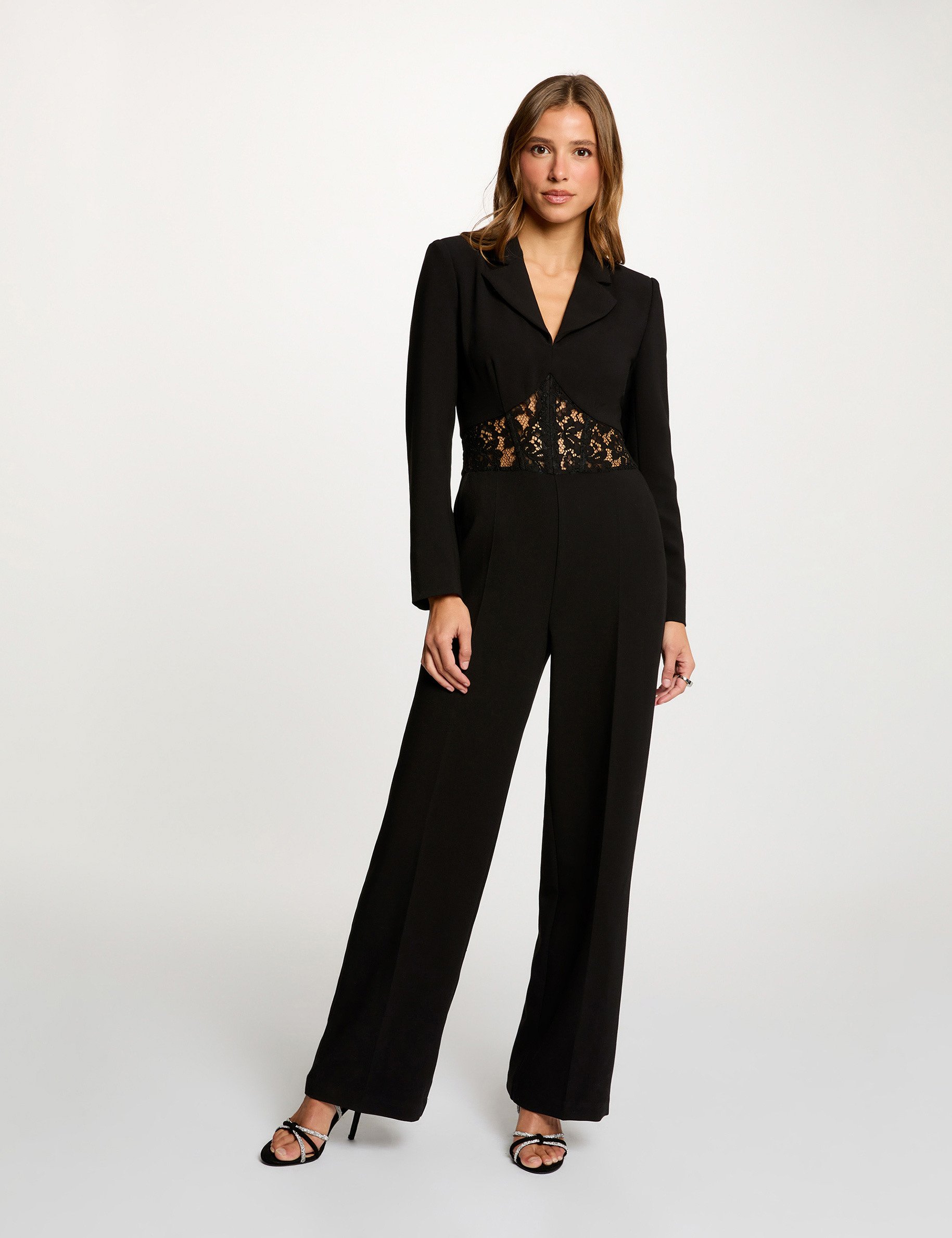 Kant jumpsuit met reverskraag zwart vrouw