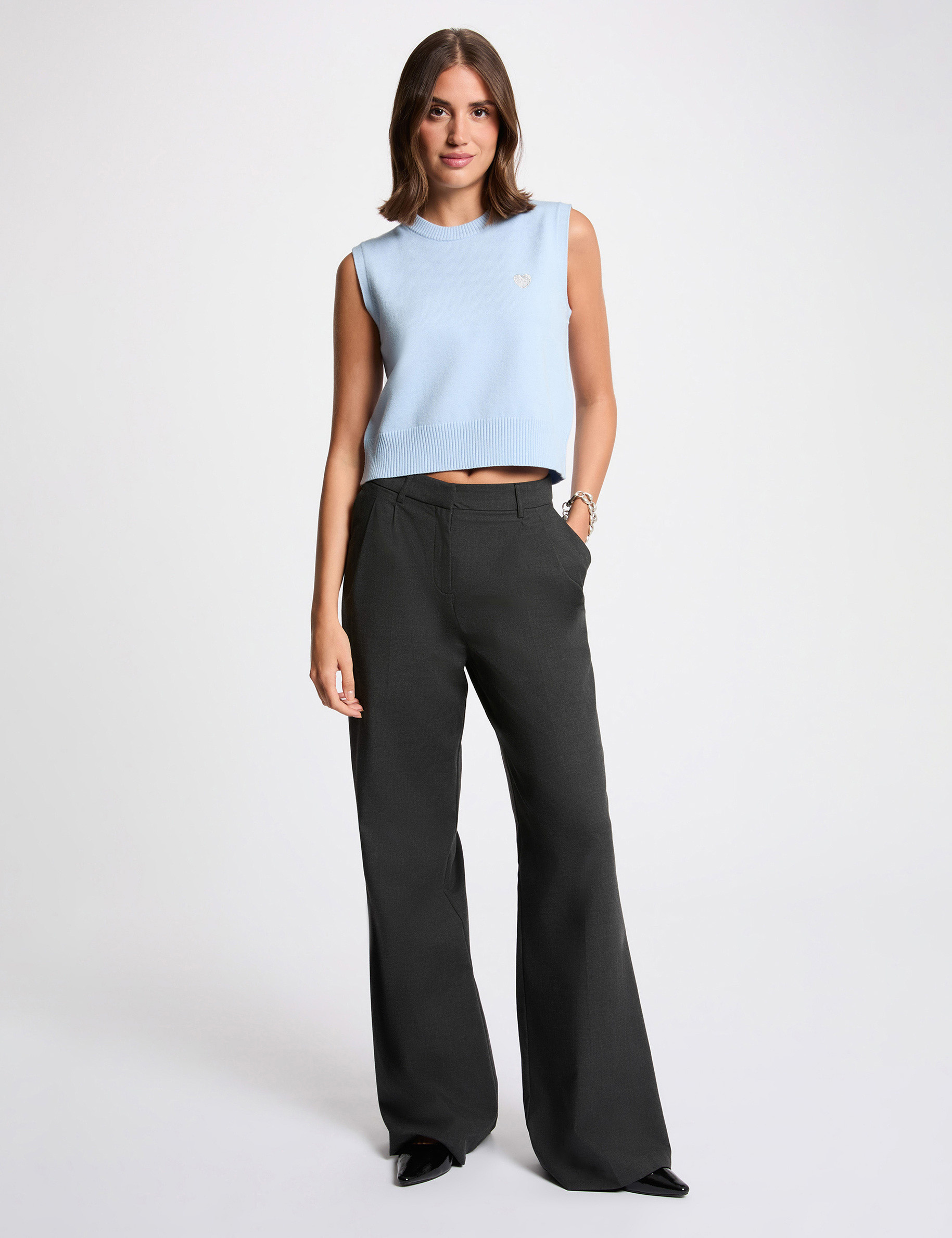 Mouwloze geborduurde trui hemelsblauw vrouw