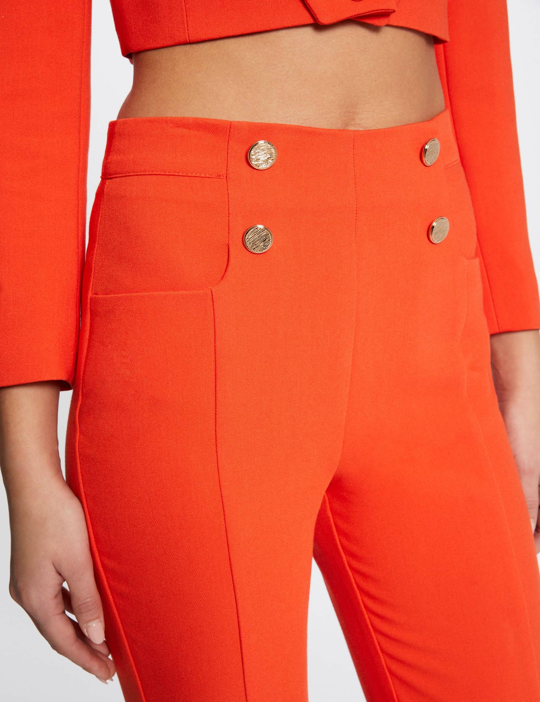 Pantalon city ajusté 7/8ème avec boutons orange femme