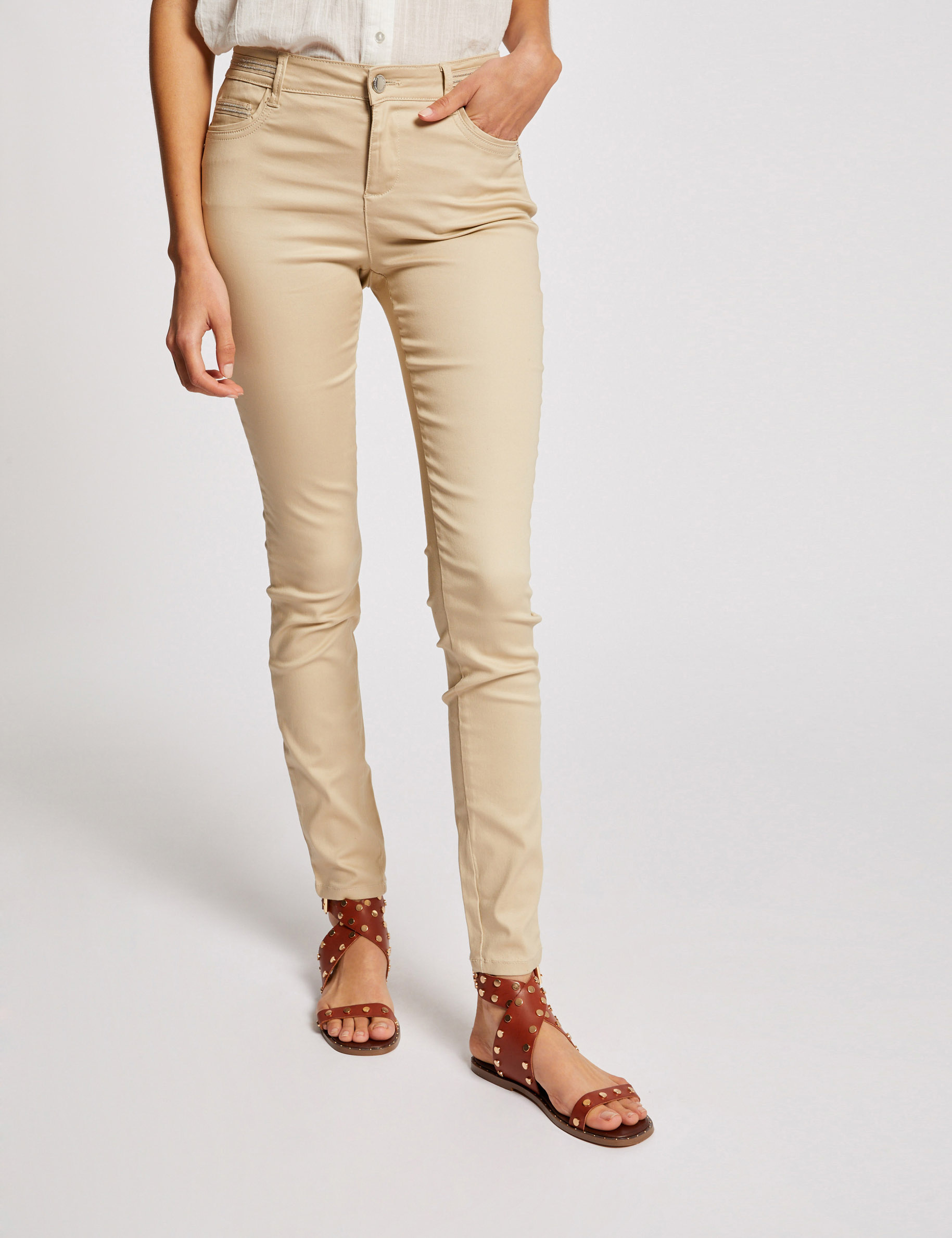 Gecoate slimfit broek zand vrouw