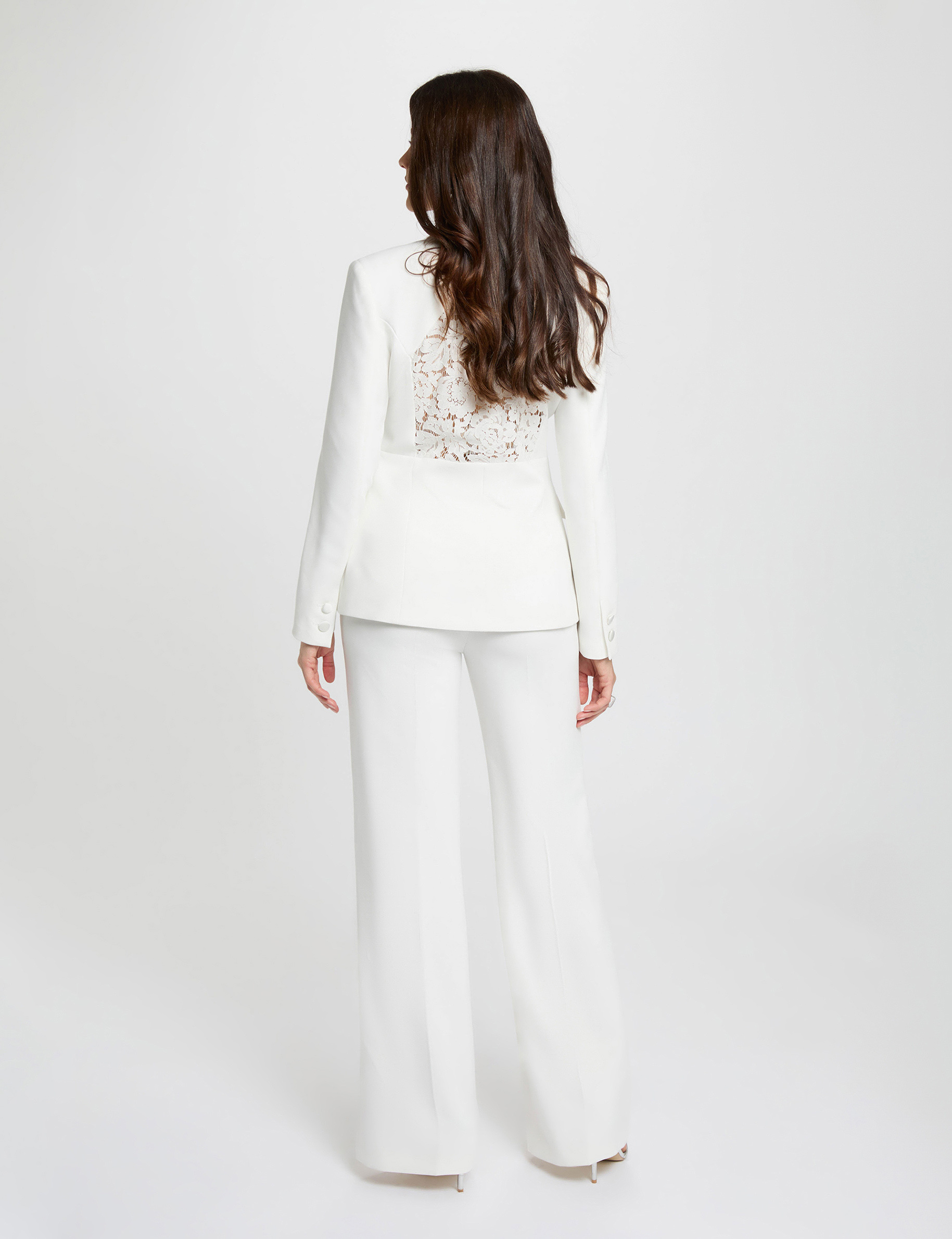 Hoge taille brede broek helder wit vrouw