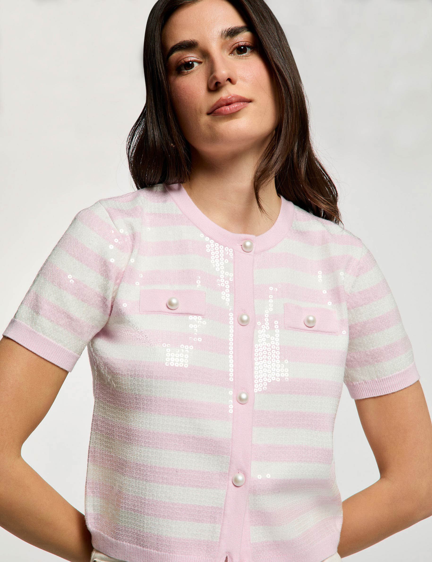 Gestreept vest met pailletten roze vrouw