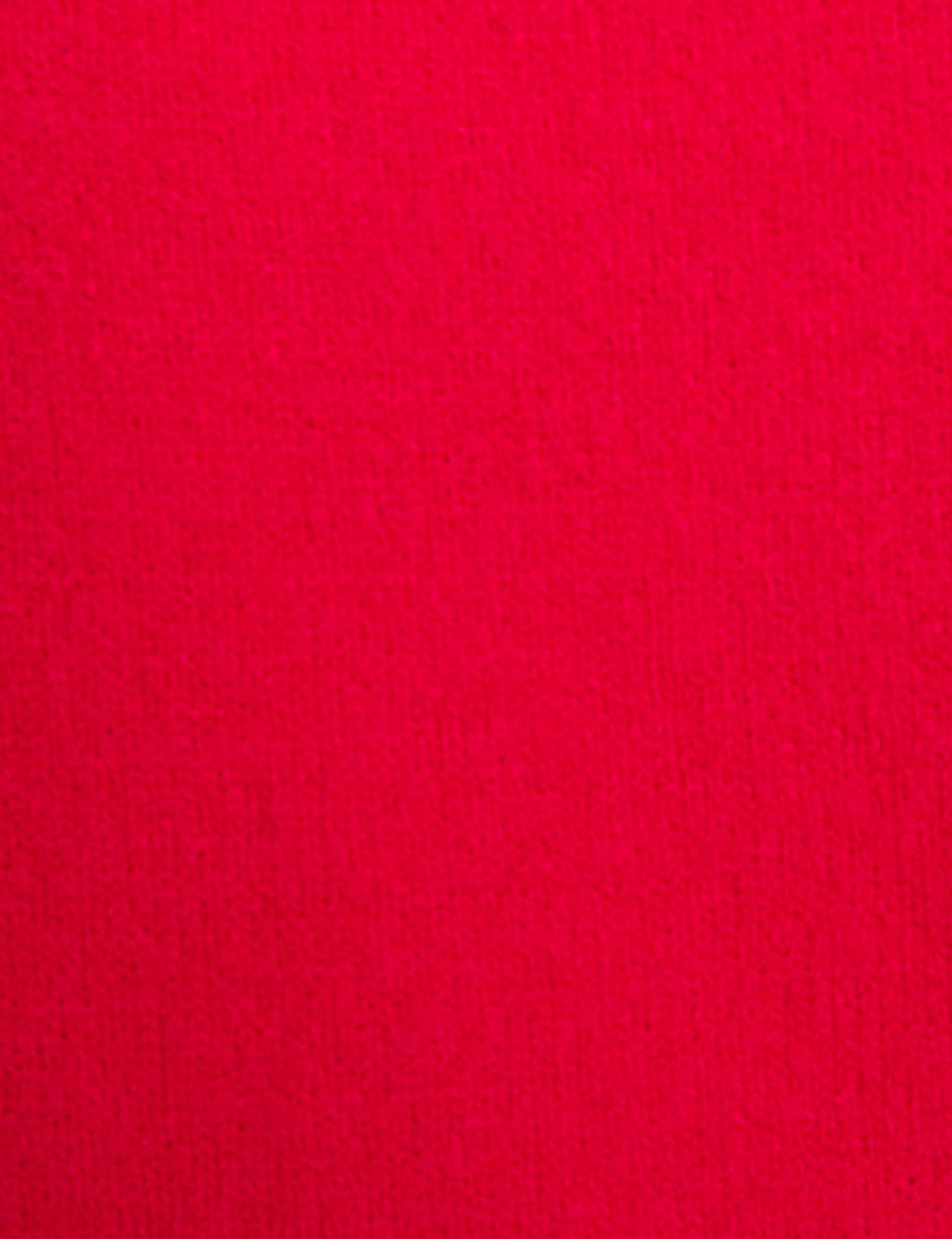 Pull asym&eacute;trique avec bijou rose vif femme