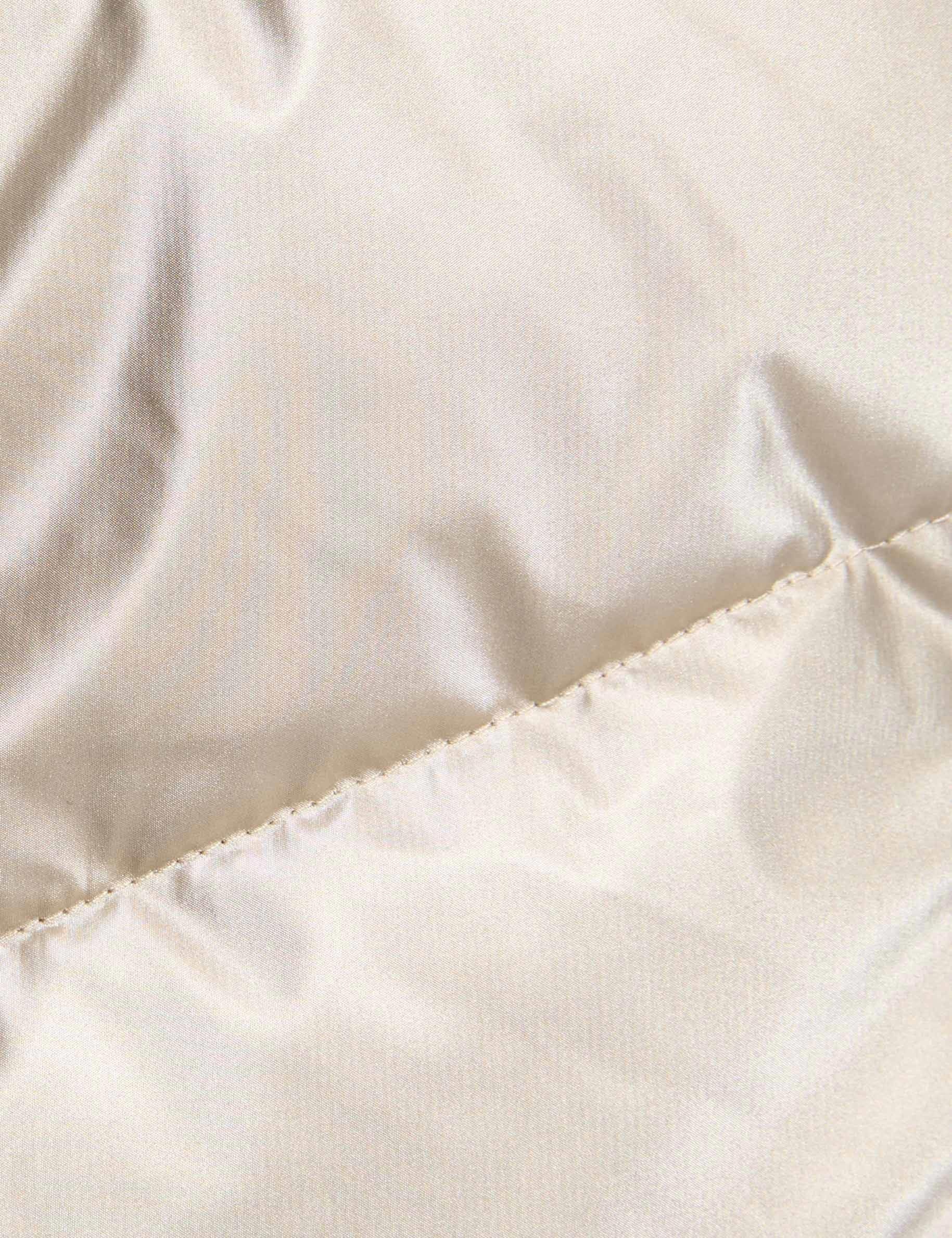 getailleerde halflange donsjas goudgeel vrouw null