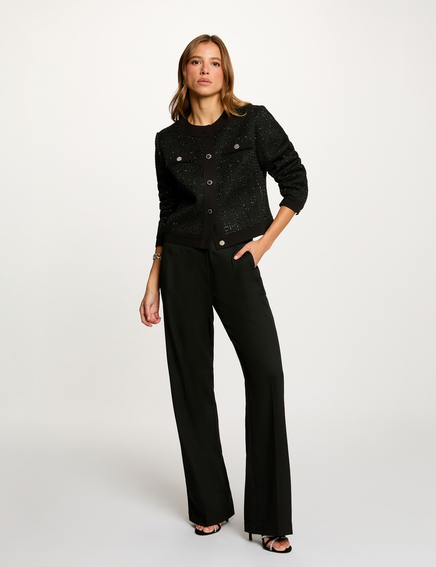 Flare broek met plooien zwart vrouw