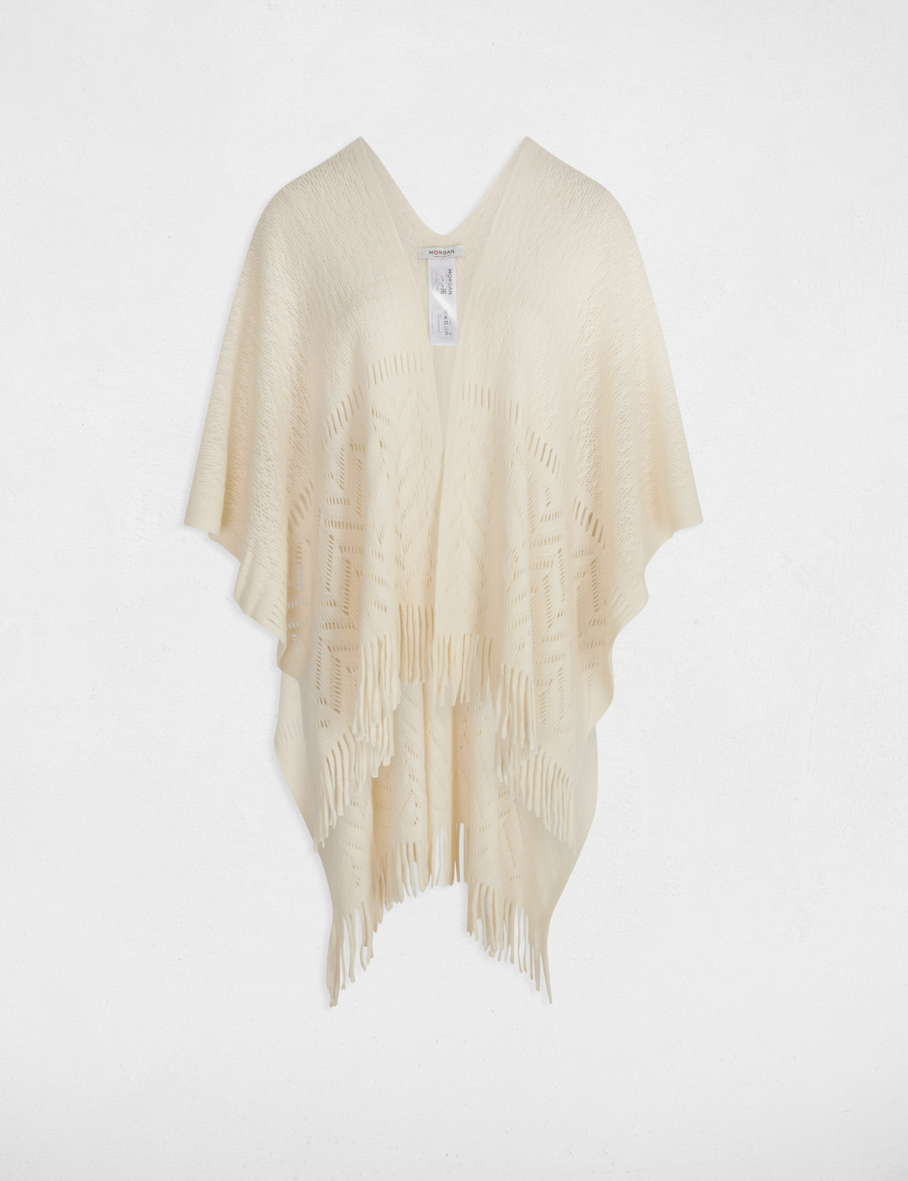 gebreide cape met franjes ivoor vrouw Gebreide cape met franjes ivoor vrouw
