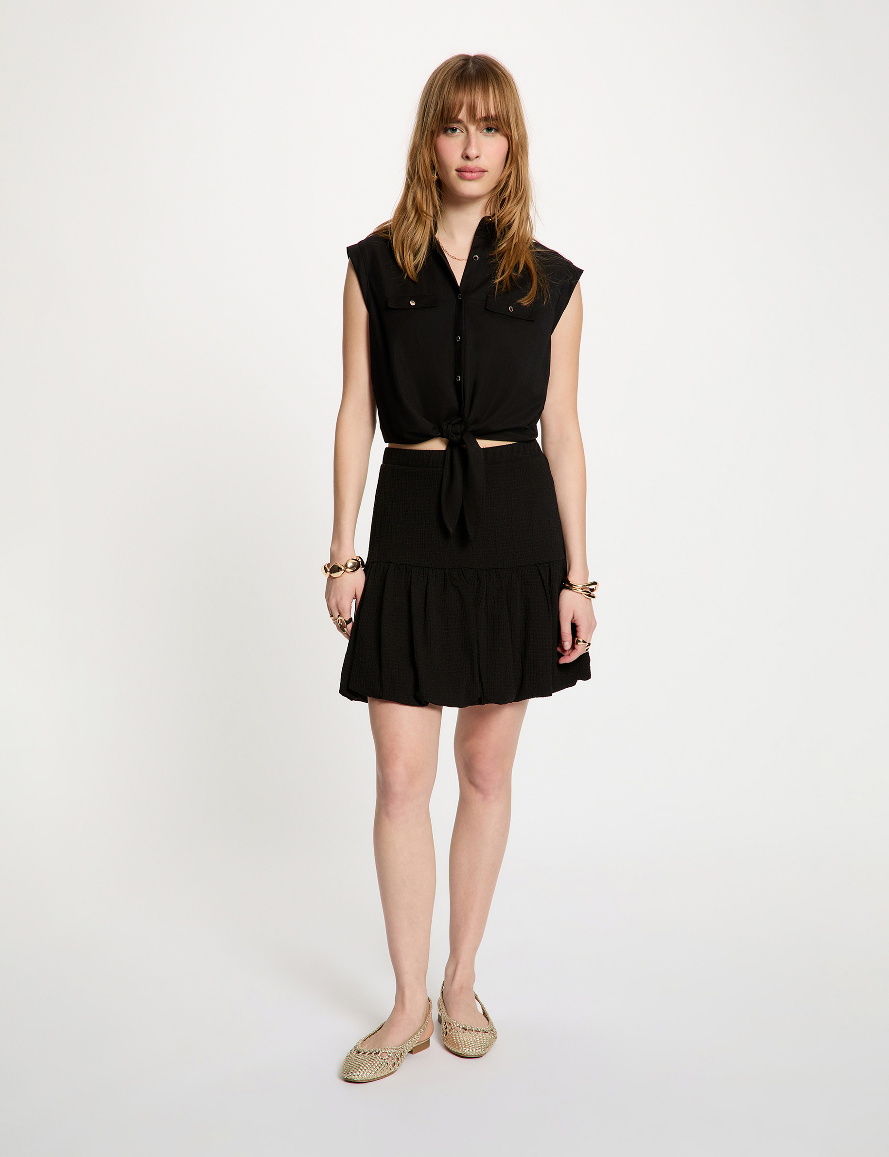 Korte geplooide rok zwart vrouw