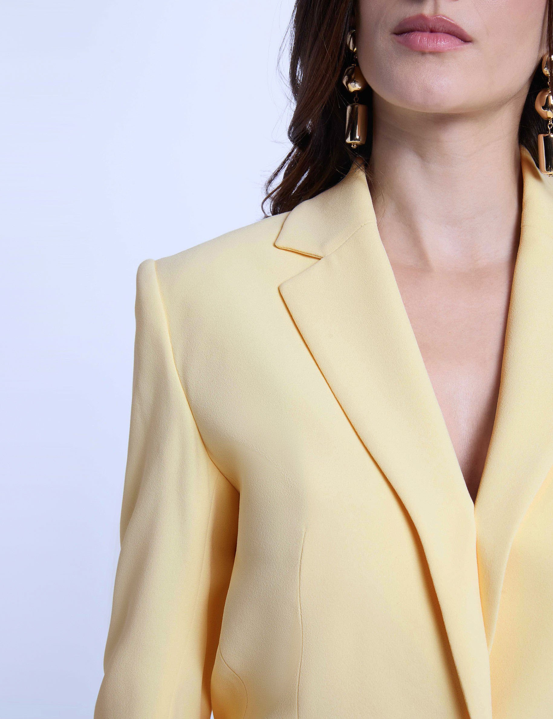 Tailleurkraag jas lichtgeel vrouw