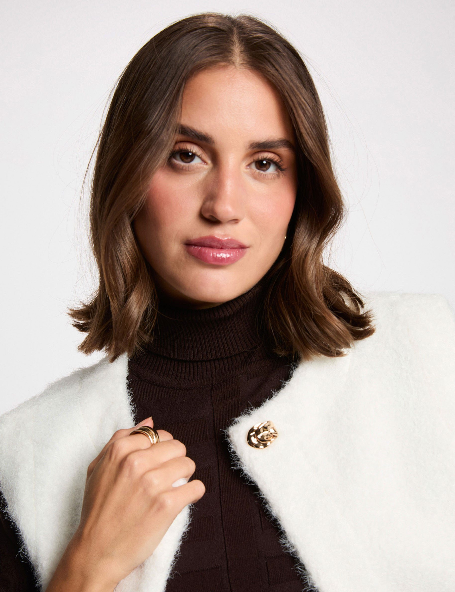 mouwloze jas ivoor vrouw Mouwloze jas ivoor vrouw